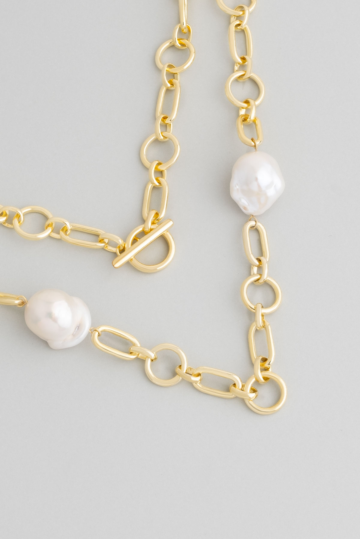 Hollow Baroque Pearl Design 18 Karat Gold Color Plated Silver Design Bracel