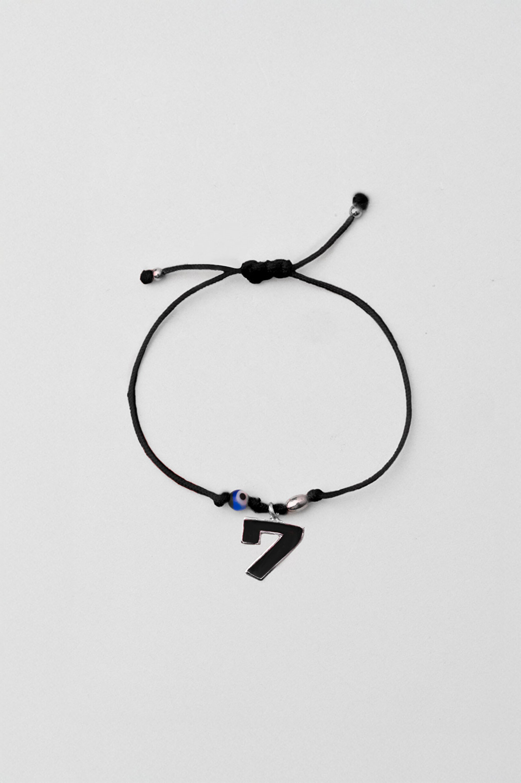 ⁠ 7 Sayısı İkonlu 18 Ayar Beyaz Altın Kaplama Ayarlanabilir İpli Bileklik_0}