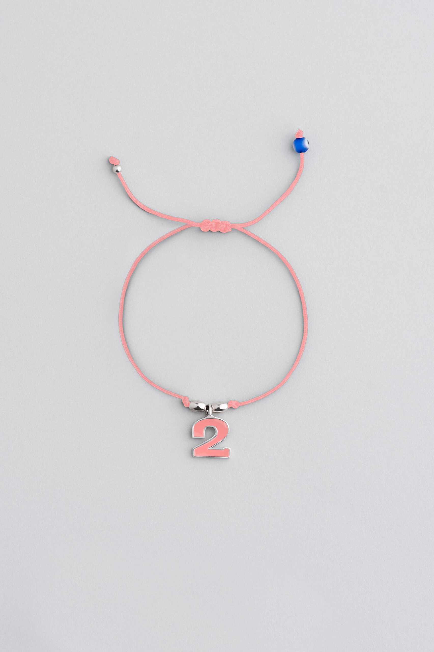 ⁠ 2 Sayısı İkonlu 18 Ayar Beyaz Altın Kaplama Ayarlanabilir Gümüş İpli Bileklik_0}