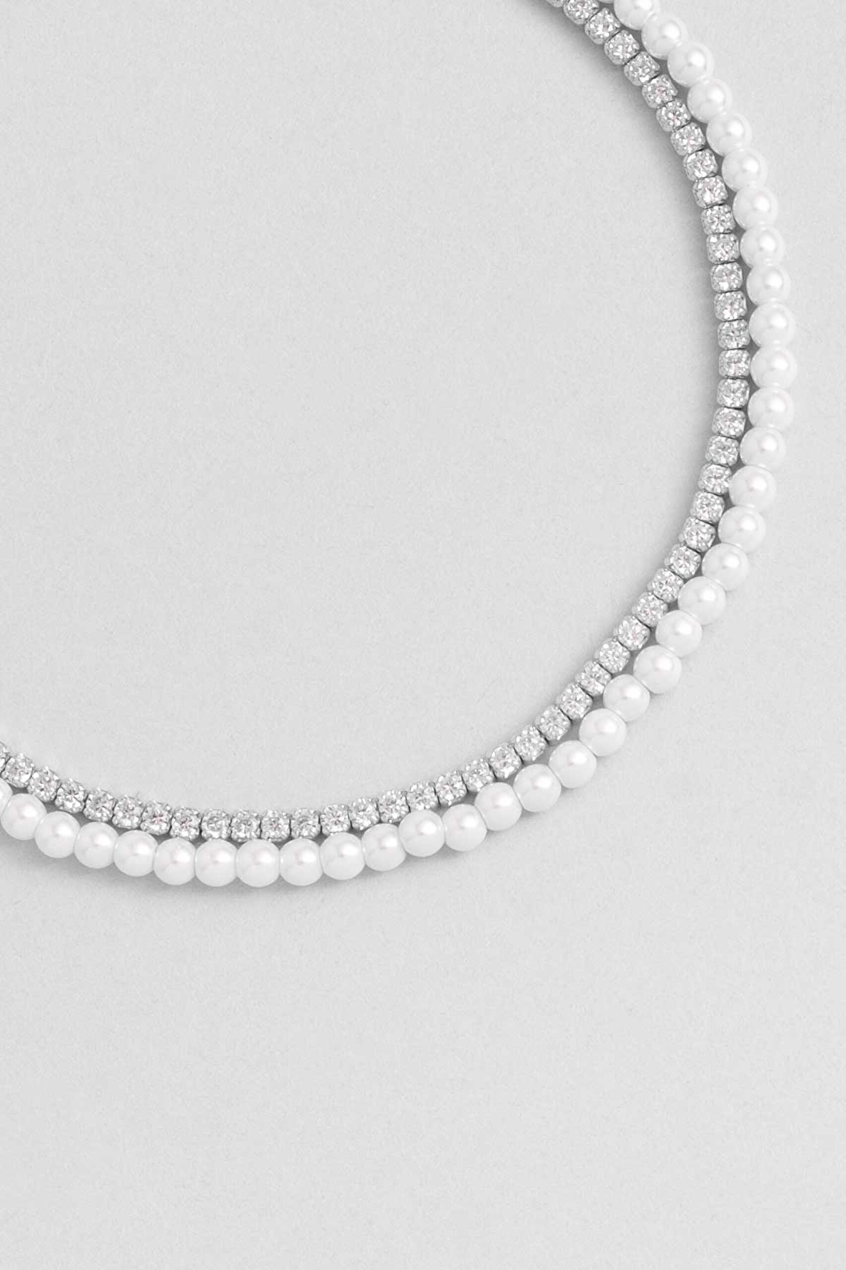 ⁠ İkonik İnci 18 Ayar Sarı Altın Kaplama 19 Cm Gümüş Su Yolu Bileklik
_1}
