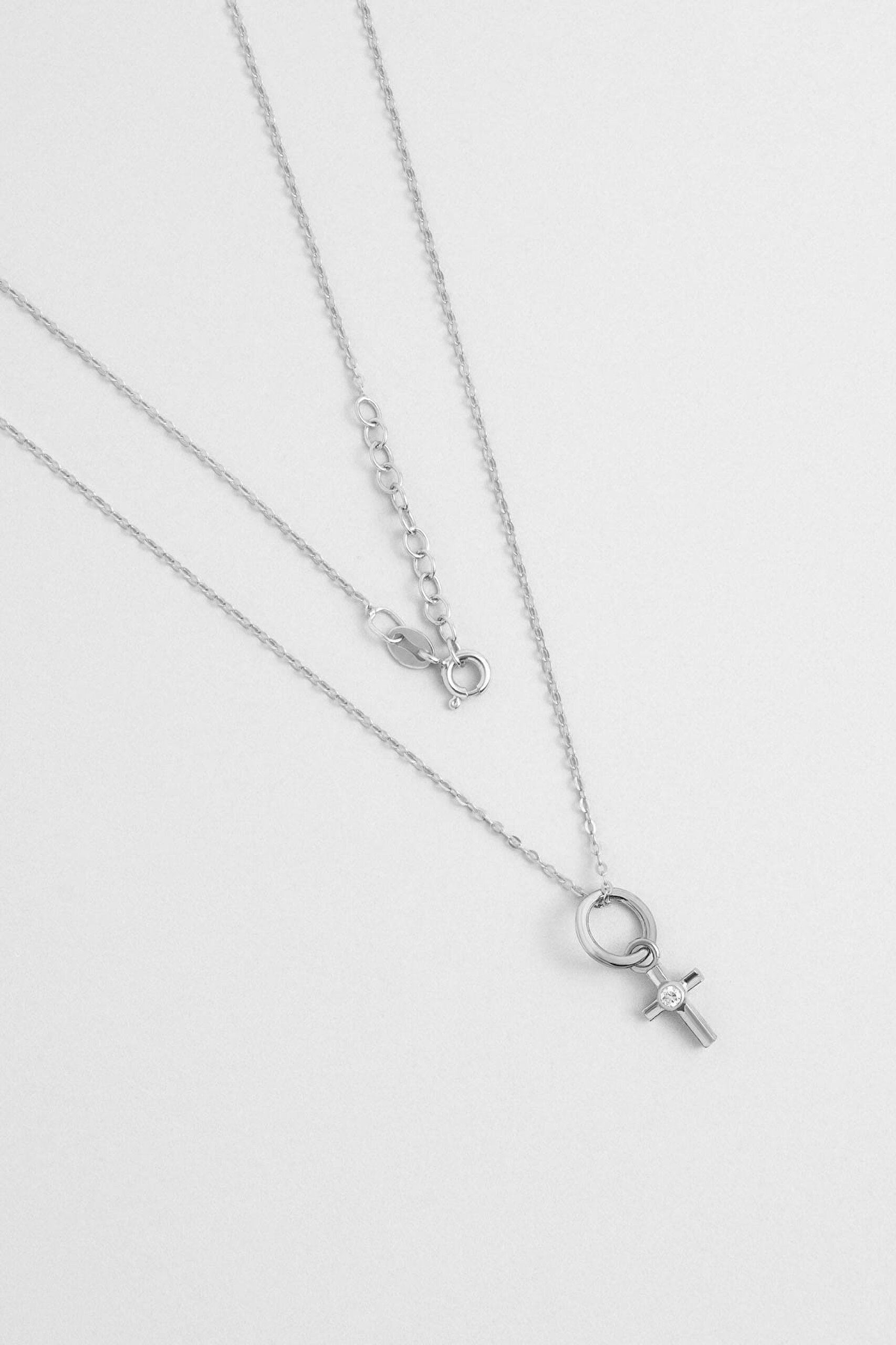 ⁠ Minimal 18 Ayar Beyaz Altın Kaplama 43 Cm Gümüş Cross Kolye
_0}