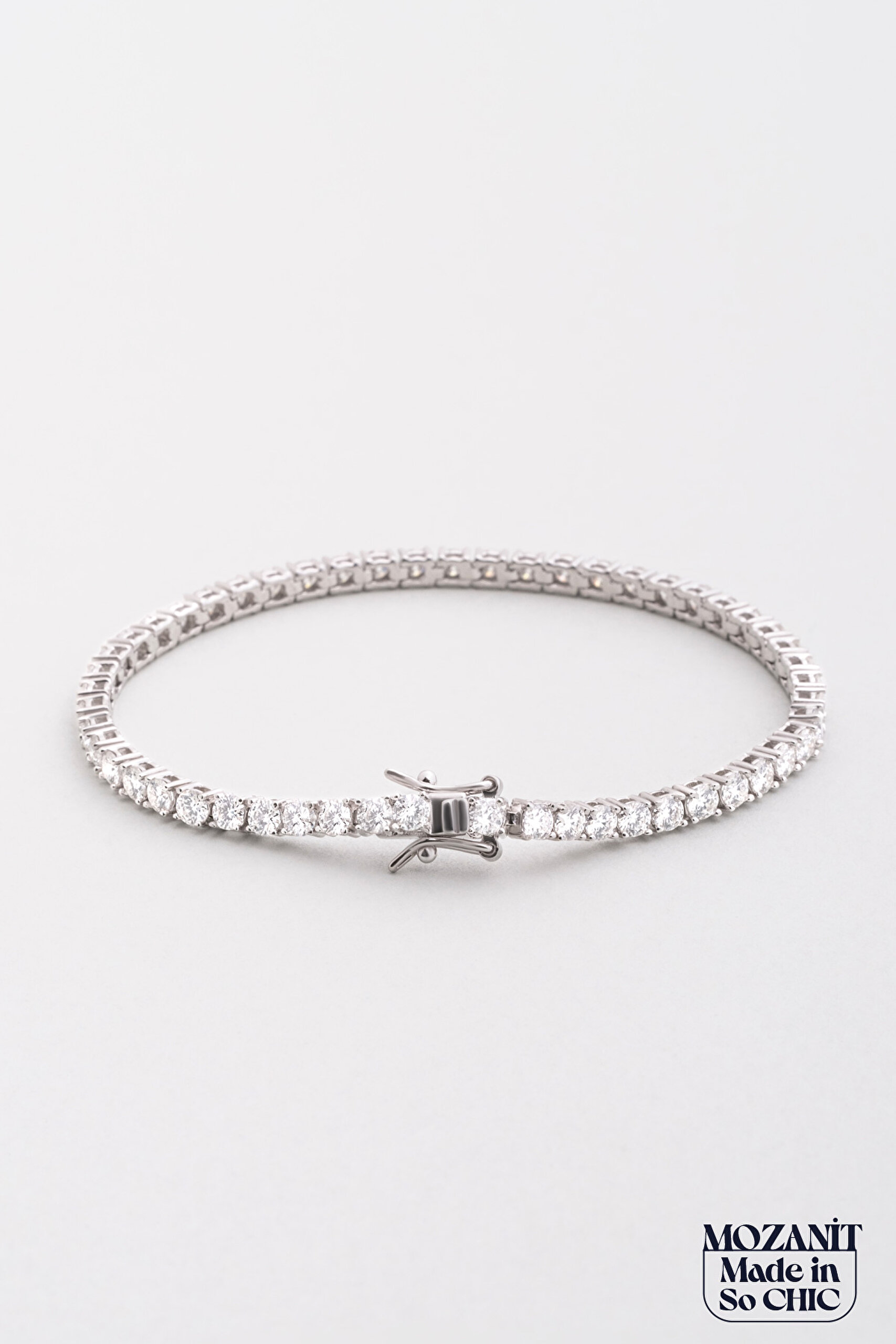 ⁠ Berrak Mozanit 18 Ayar Beyaz Altın Kaplama 17 Cm Gümüş Su Yolu Bileklik_0}