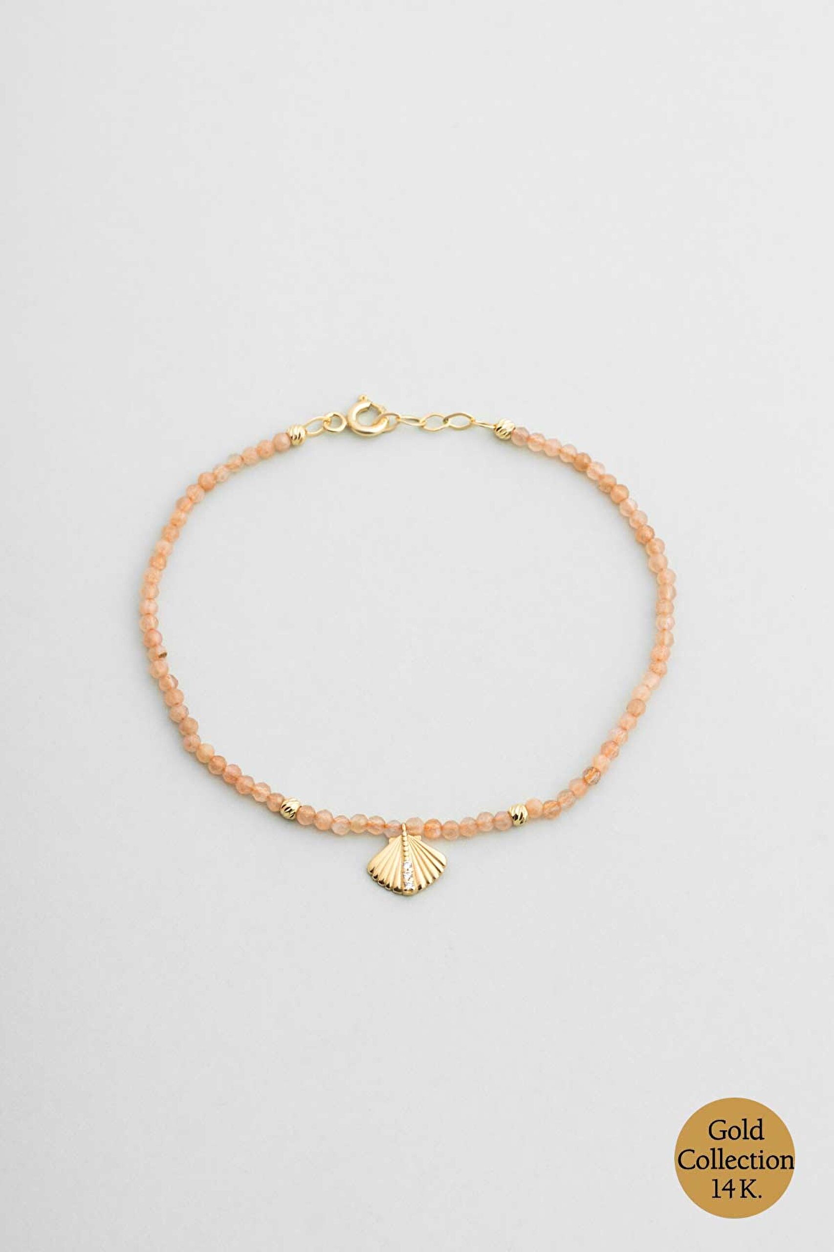 ⁠ Deniz Kabuğu Figürlü Güneş Taşlı 14 Ayar Altın Bileklik_0}